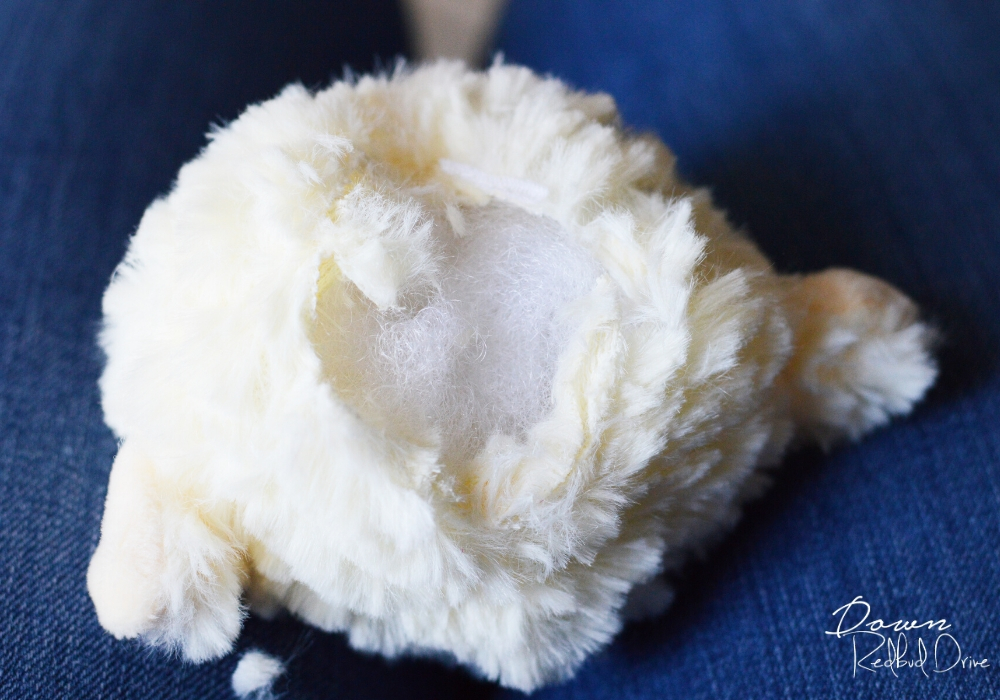 the head of a stuffed lamb