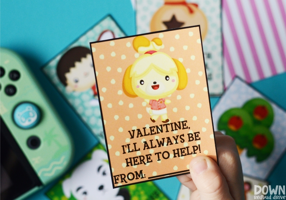A child holding a valentine that says "Valentine, I'll always be here to help!" on it.