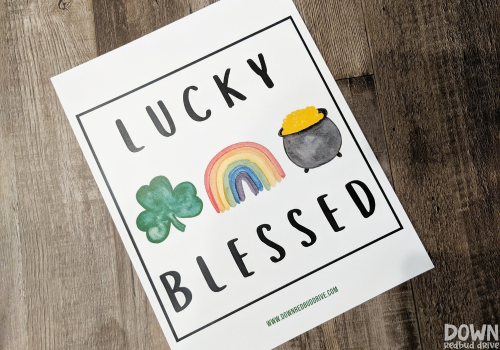 Overhead of the free printable for the DIY lucky blessed art.