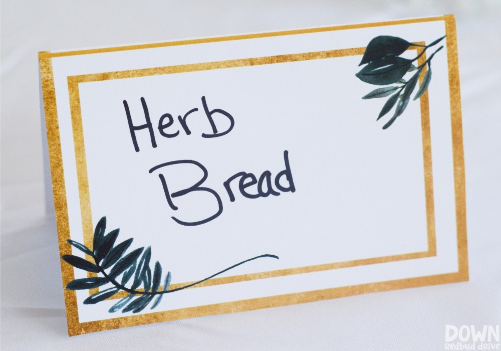 Close up of the DIY Greenery Baby Shower food cards.