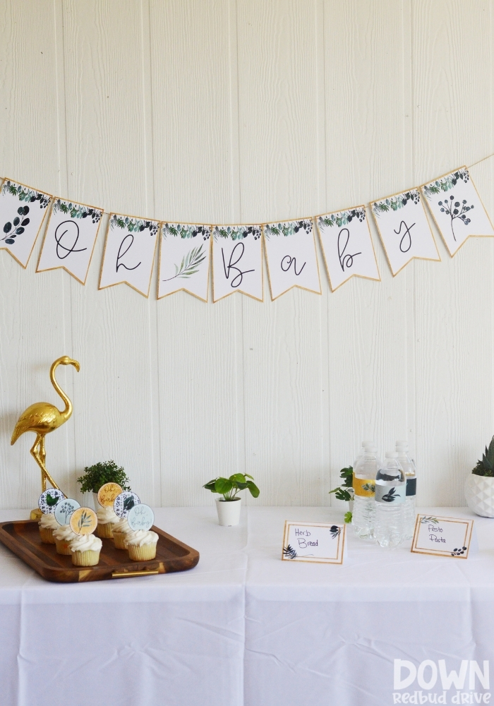 Tall picture of the decorations for the DIY Greenery Baby Shower.