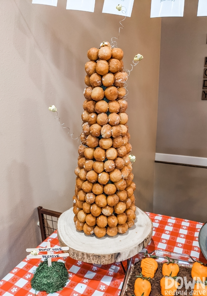 A "Donut Hole Beehive" food display for the Winnie the Pooh birthday party.