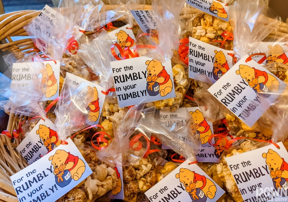 Winnie The Pooh themed snack mix bags with printable tags that say "For the rumbly in your tumbly".