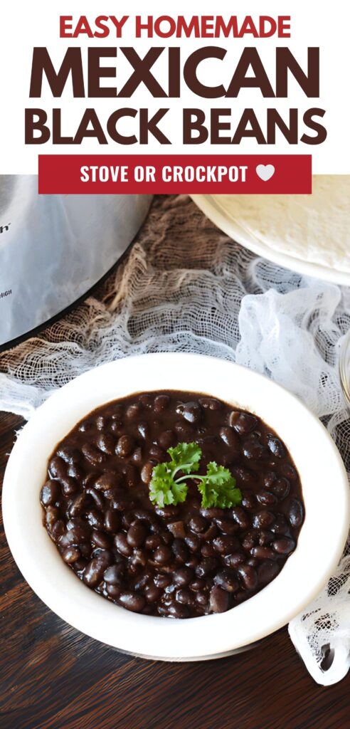Homemade black beans in a white bowl next to a crockpot, bowl of cheese and pile of tortillas with a text overlay that says easy homemade mexican black beans stove or crockpot