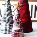 3 different heights of DIY flannel trees in a Christmas decor setting