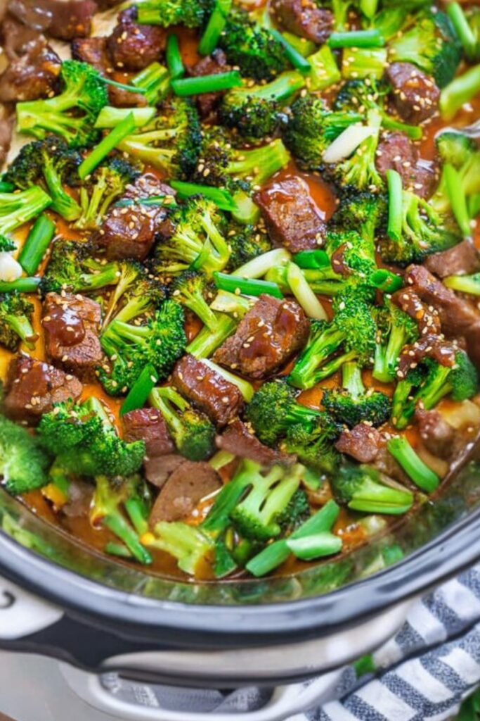 Finished beef and broccoli in a slow cooker ready to serve