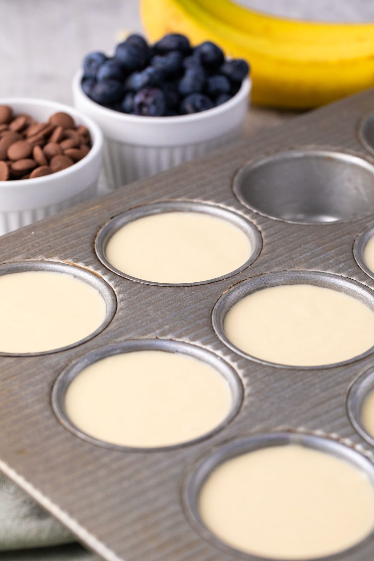 batter in muffin tins 