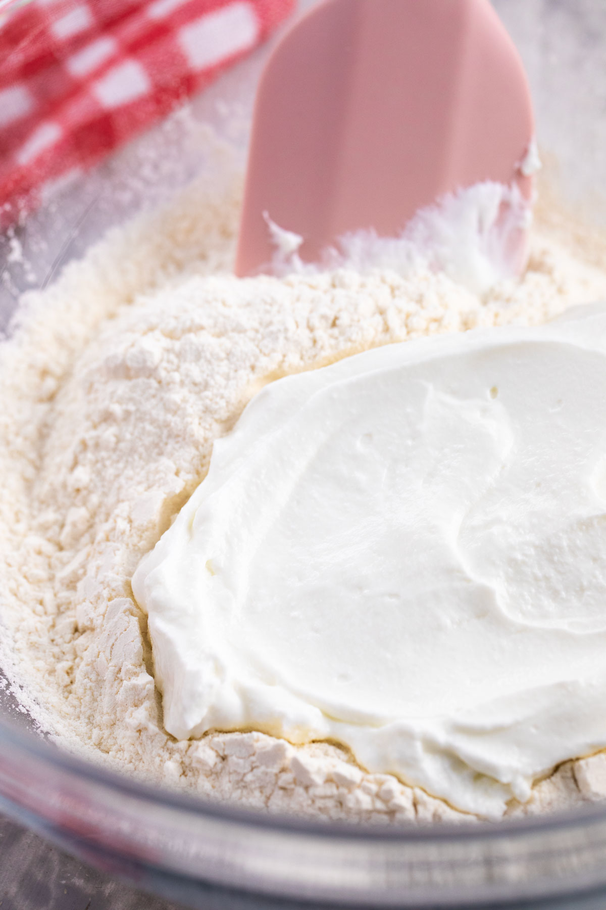 mixing yoghurt and flour 