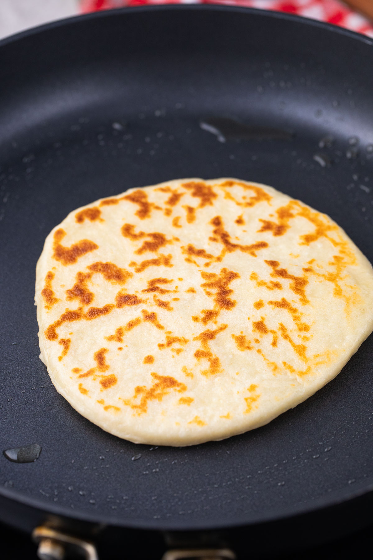 yoghurt naan in the pan