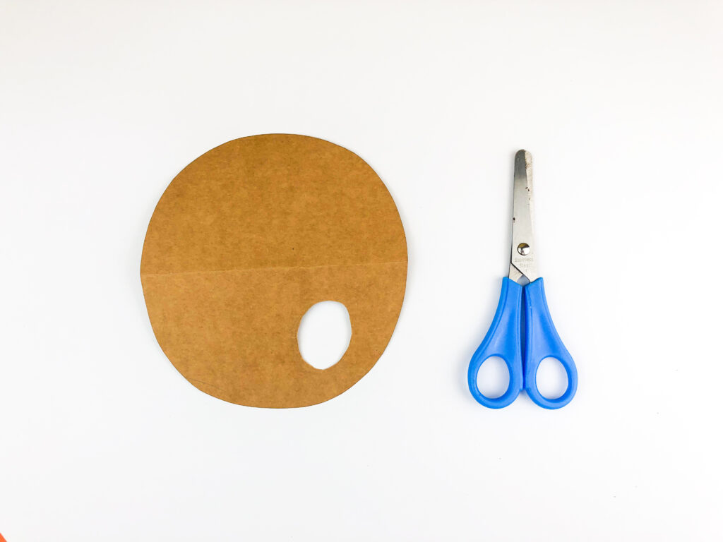 cut a hole in the paper