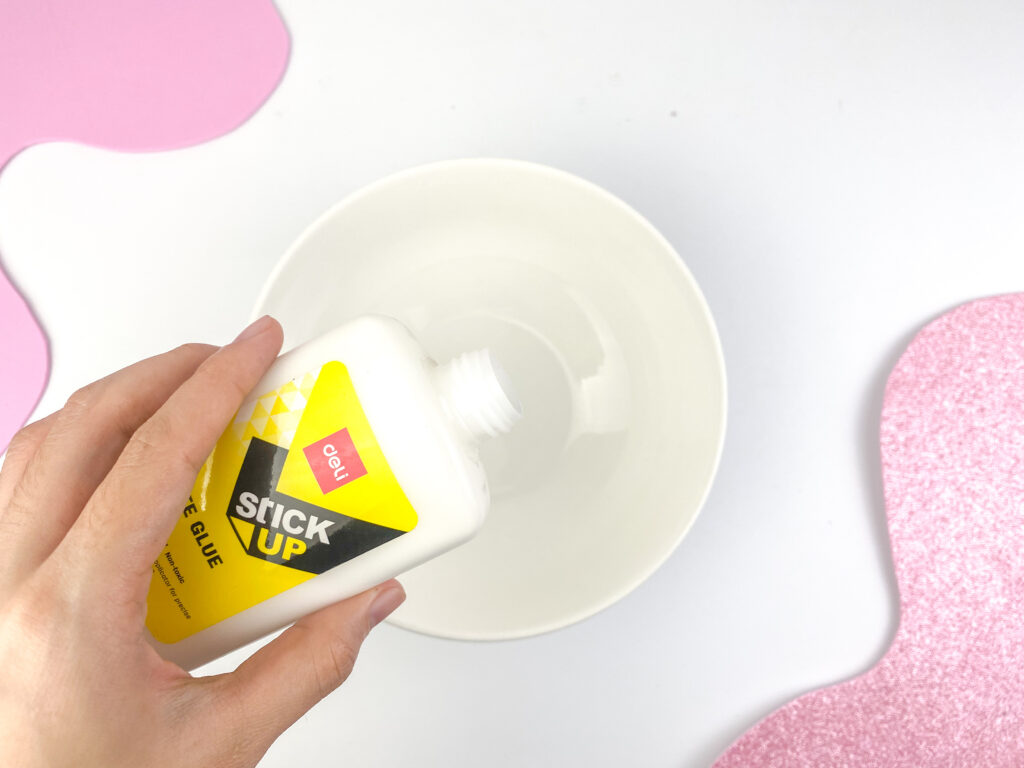 adding glue to make slime 