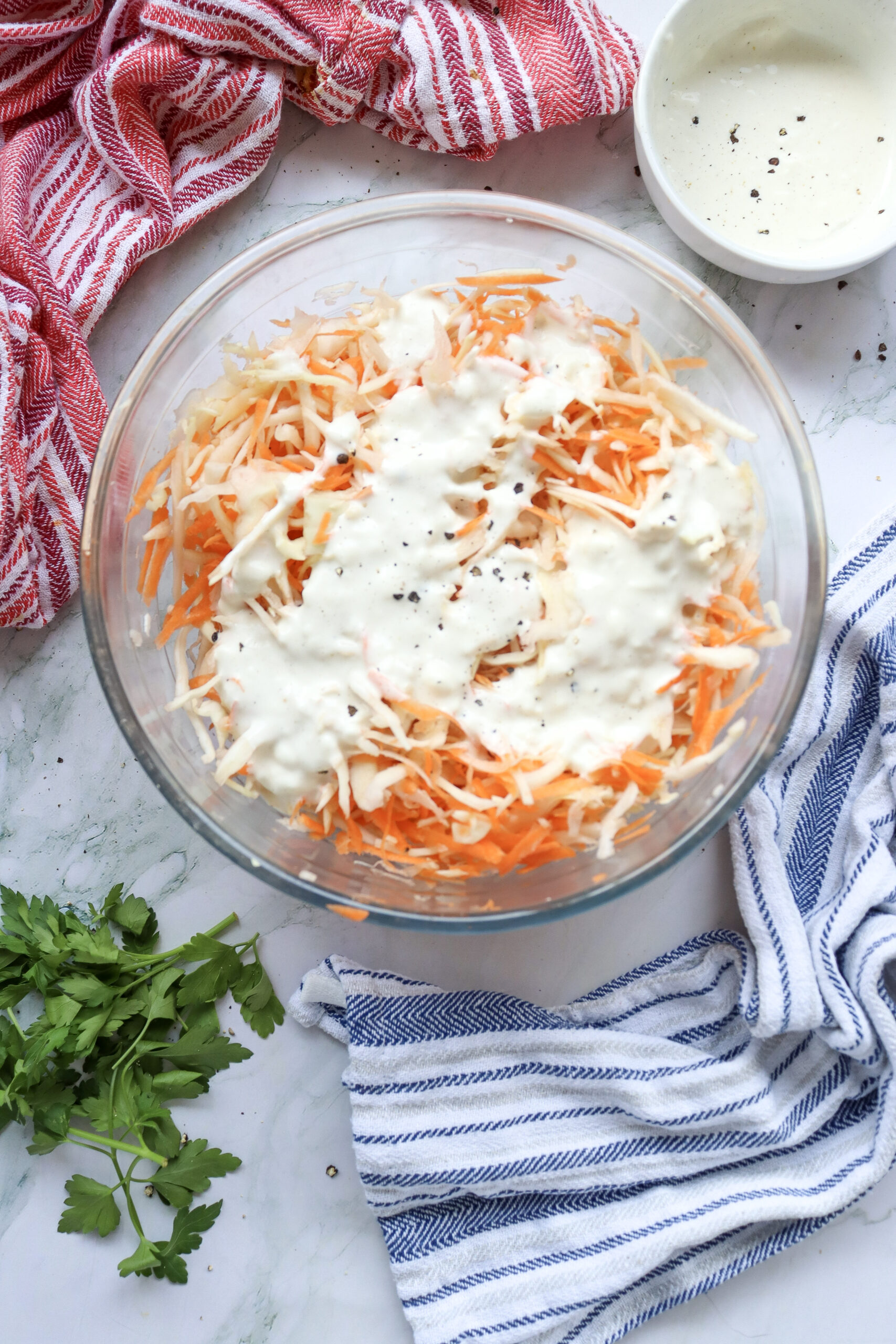 mixing coleslaw