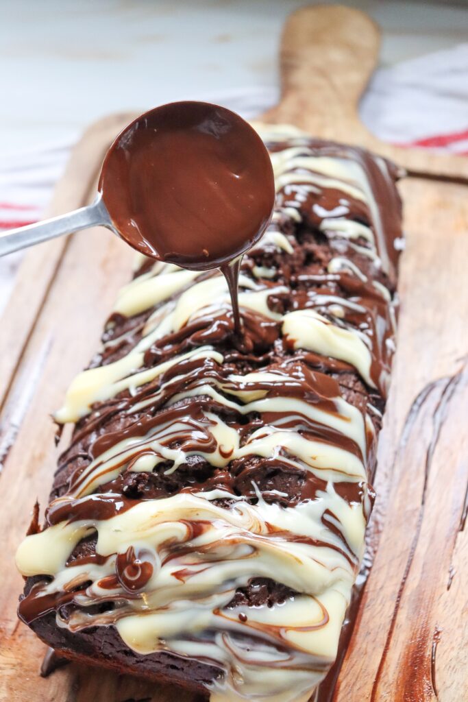 adding chocolate drizzle